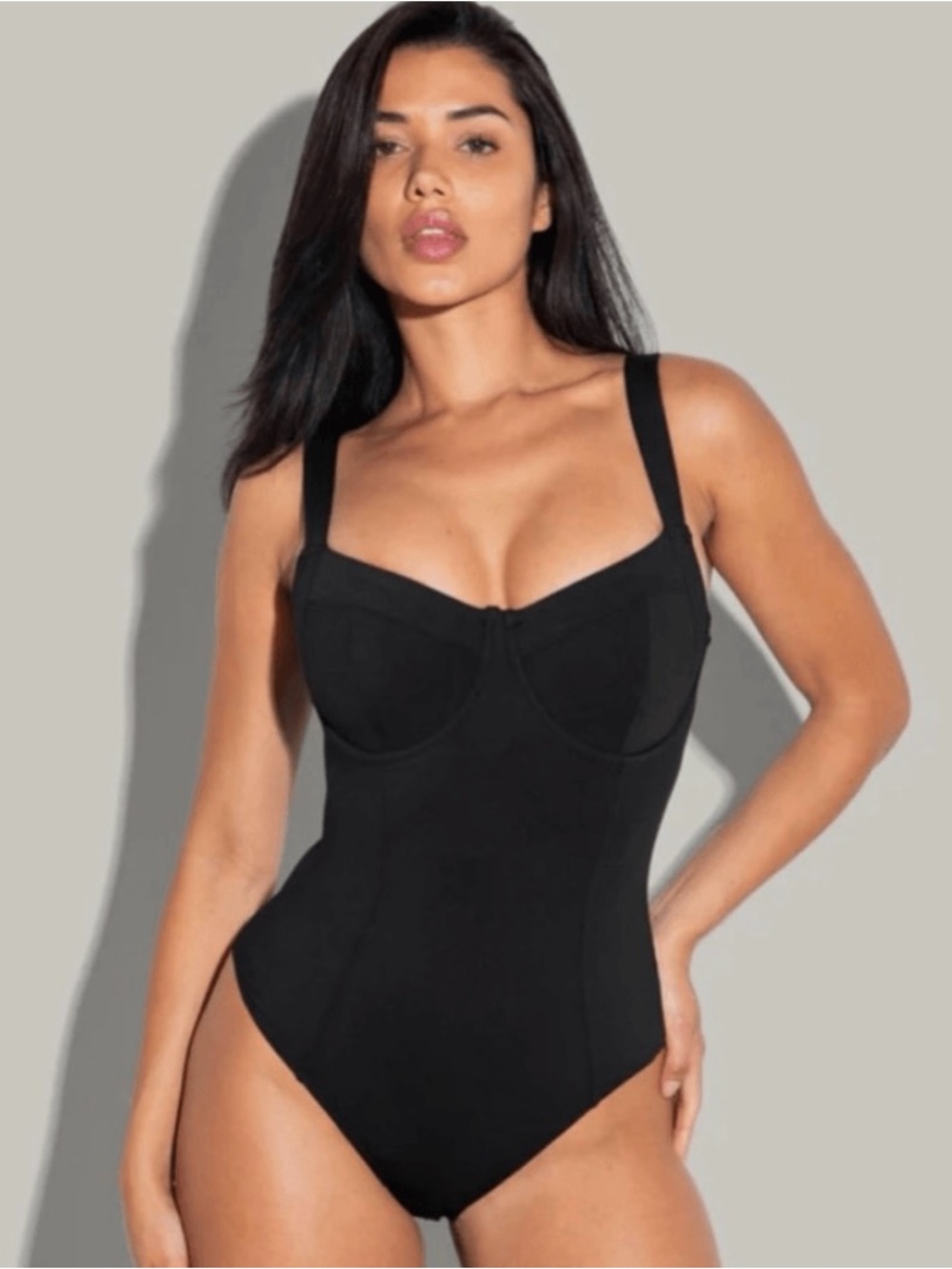 Sleek Black One-Piece Swimsuit with Supportive Cups